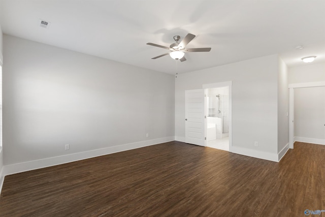 unfurnished bedroom featuring dark wood-style flooring, visible vents, ceiling fan, and baseboards