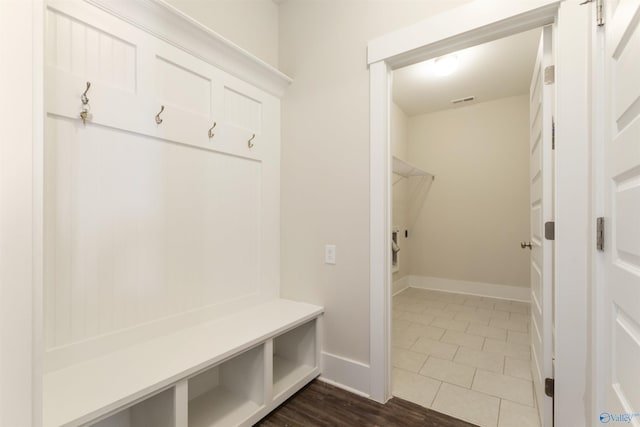 mudroom with visible vents and baseboards