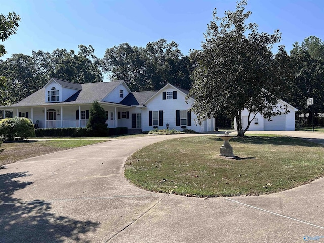 view of front of property with a front yard and covered porch