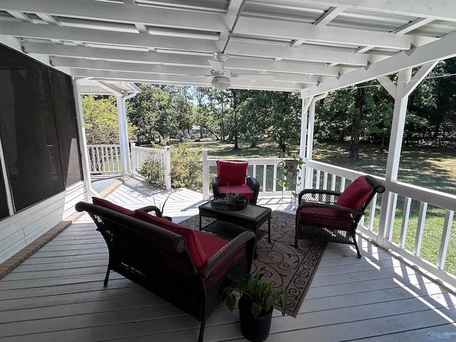 deck featuring a pergola and outdoor lounge area