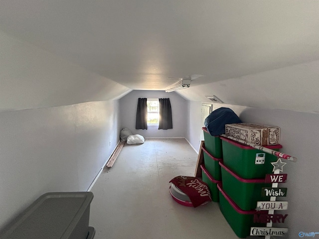 bonus room featuring vaulted ceiling