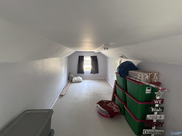 bonus room featuring vaulted ceiling