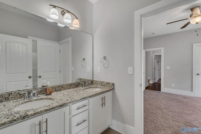 bathroom with vanity and ceiling fan