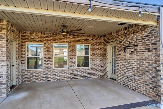 view of patio / terrace featuring ceiling fan