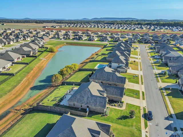 bird's eye view featuring a water and mountain view