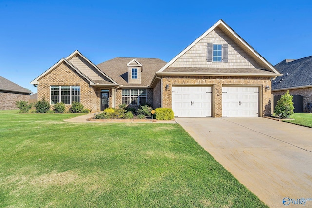 craftsman house with a front yard and a garage