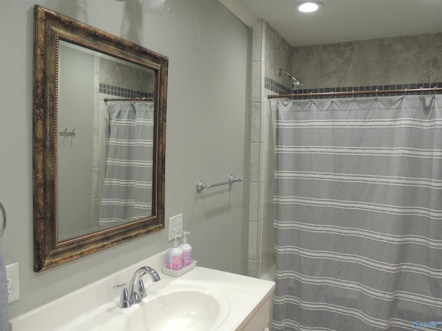 full bathroom with vanity, a shower with shower curtain, and recessed lighting