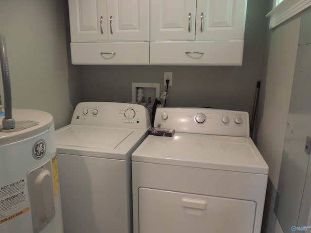 laundry area with water heater, cabinet space, and independent washer and dryer