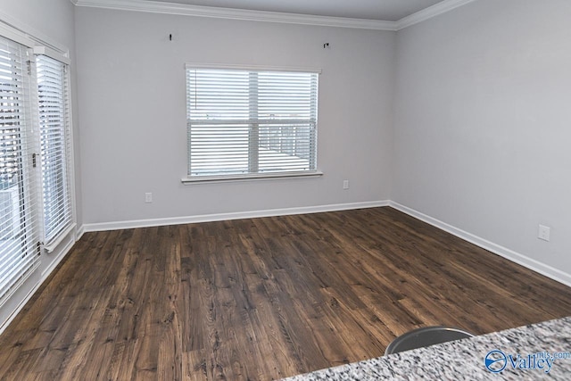 unfurnished bedroom with ornamental molding and dark wood-type flooring