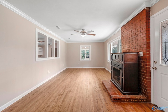 unfurnished living room featuring crown molding, light wood-type flooring, and ceiling fan