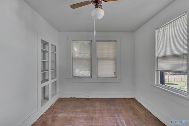 1011 Hermosa Ave, Gadsden, AL 35901 - unfurnished room with a ceiling fan, built in features, dark wood-style floors, and baseboards