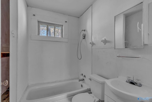 1011 Hermosa Ave, Gadsden, AL 35901 - full bathroom with toilet, tile walls, shower / tub combination, and vanity
