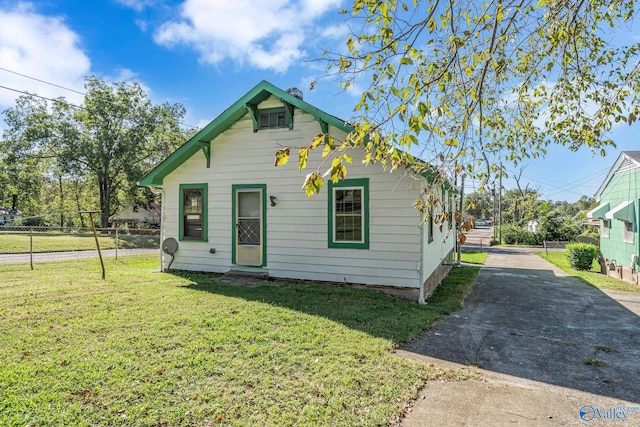 exterior space with a yard