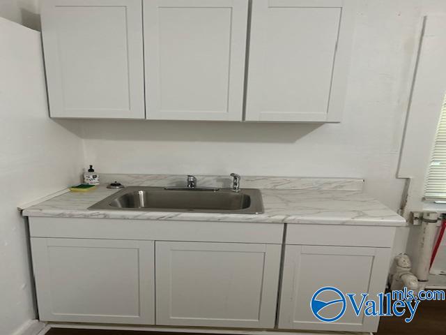 laundry area featuring a sink