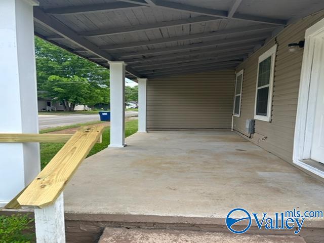 view of patio featuring a carport