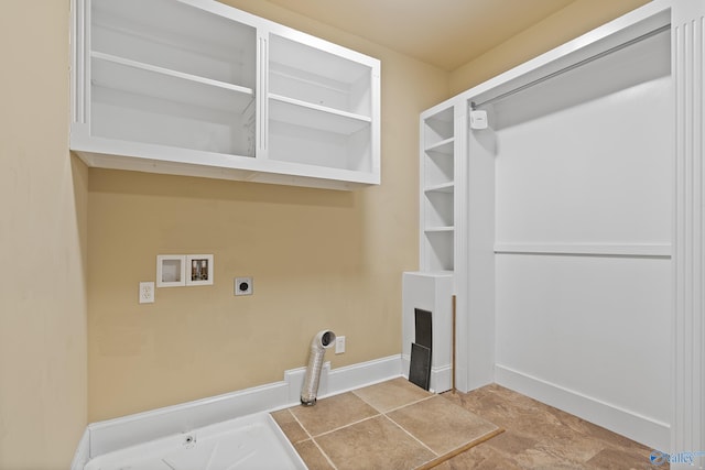 laundry area featuring hookup for an electric dryer, laundry area, washer hookup, a fireplace, and baseboards