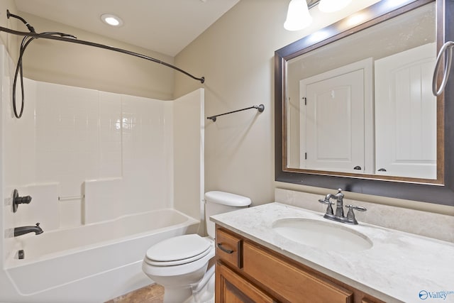 full bath featuring washtub / shower combination, vanity, and toilet