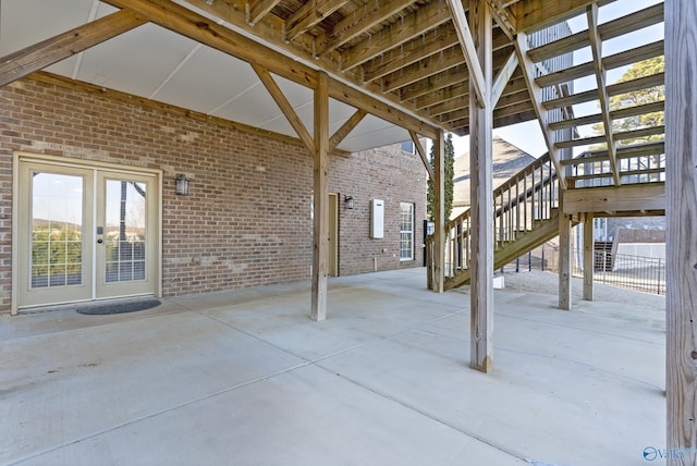 view of patio / terrace with stairway and french doors