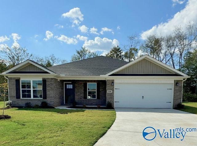 ranch-style home featuring a garage and a front lawn