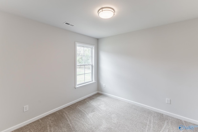 empty room featuring carpet