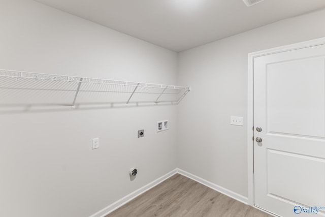 laundry room with washer hookup, light wood-type flooring, and electric dryer hookup