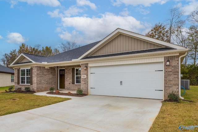 single story home with central AC unit, a garage, and a front yard