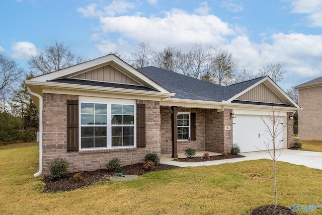 view of front facade with a garage and a front lawn