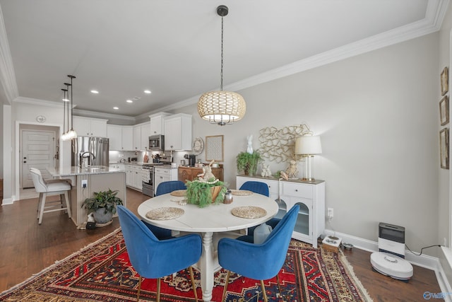 dining space with ornamental molding, dark wood-type flooring, and baseboards