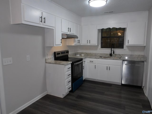 kitchen with sink, a textured ceiling, dark hardwood / wood-style flooring, white cabinetry, and stainless steel appliances