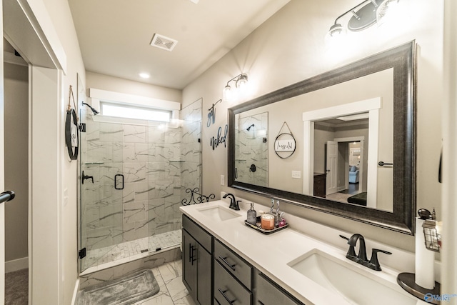 bathroom featuring vanity and walk in shower