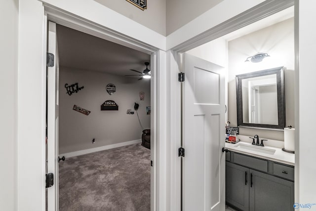 bathroom with vanity and ceiling fan