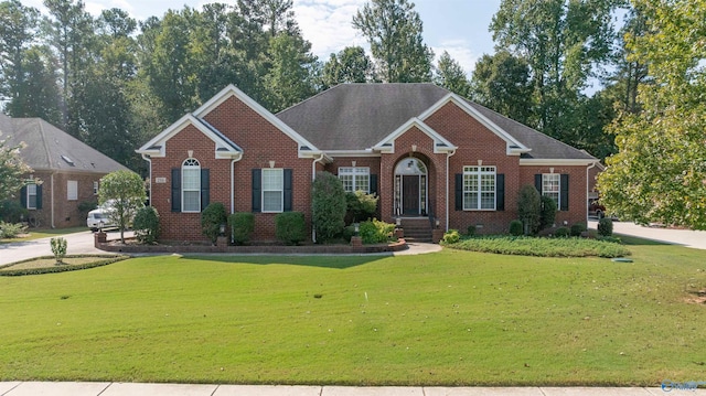 view of front of home with a front lawn