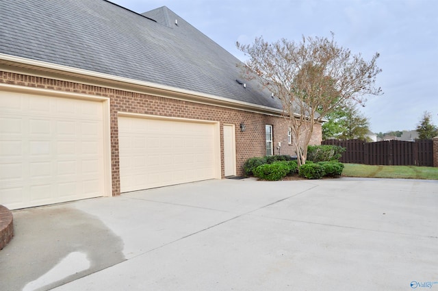 view of home's exterior with a garage