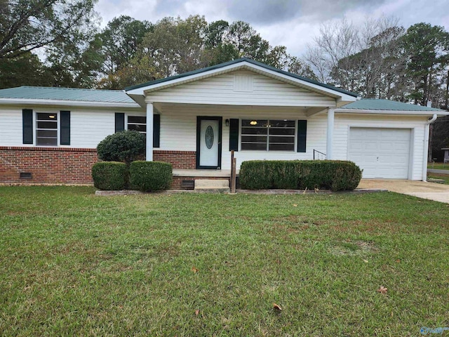 ranch-style house with a garage and a front yard