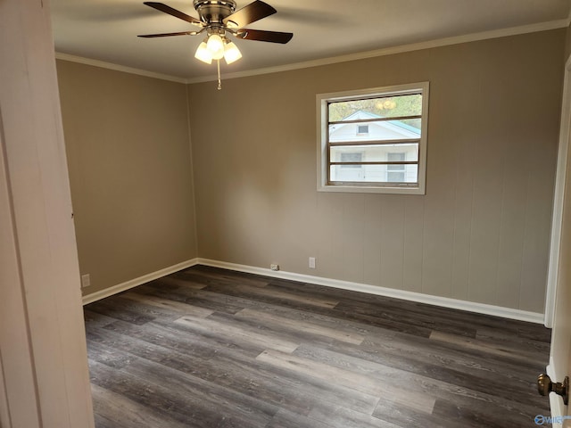 unfurnished room featuring dark hardwood / wood-style flooring, ceiling fan, and crown molding