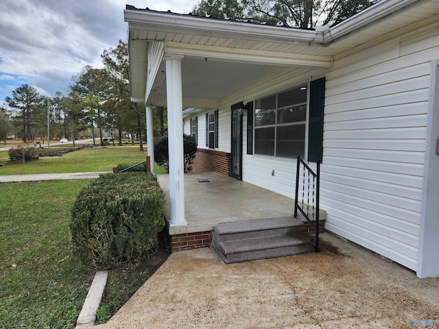 view of patio featuring a porch