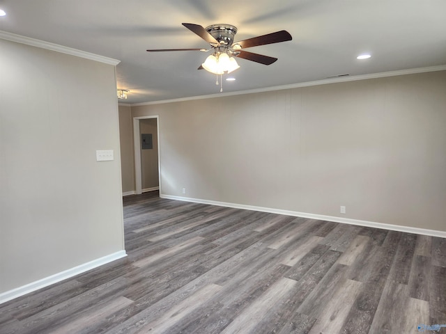 empty room featuring ornamental molding, dark hardwood / wood-style floors, and ceiling fan