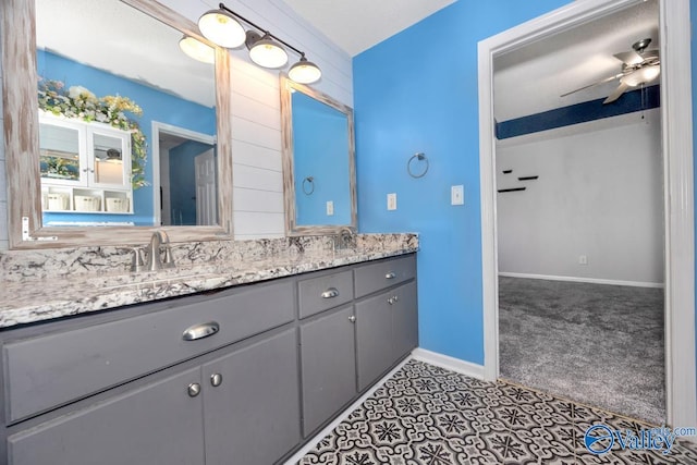 204 Hollington Dr, Huntsville, AL 35811 - bathroom with double vanity and ceiling fan