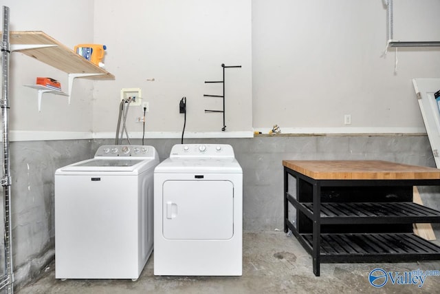204 Hollington Dr, Huntsville, AL 35811 - washroom featuring washing machine and clothes dryer and a wainscoted wall