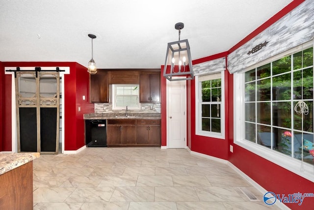 204 Hollington Dr, Huntsville, AL 35811 - kitchen featuring black dishwasher, hanging light fixtures, light marble finish floors, and tasteful backsplash