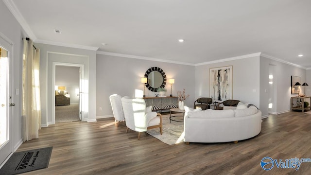 living room featuring dark hardwood / wood-style floors, plenty of natural light, and crown molding