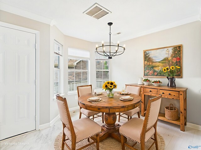 202 Declaration Cir, Madison, AL 35758 - dining space featuring a chandelier and crown molding