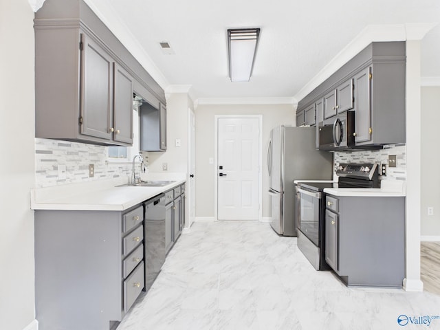 202 Declaration Cir, Madison, AL 35758 - kitchen with stainless steel appliances, tasteful backsplash, gray cabinetry, ornamental molding, and light countertops
