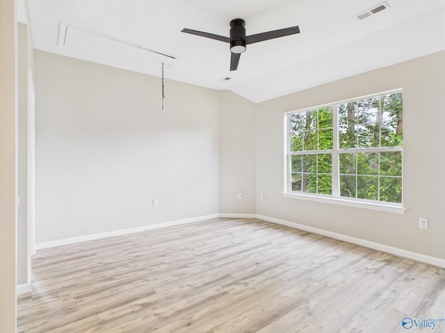 202 Declaration Cir, Madison, AL 35758 - empty room featuring attic access, light wood-style flooring, a ceiling fan, and lofted ceiling
