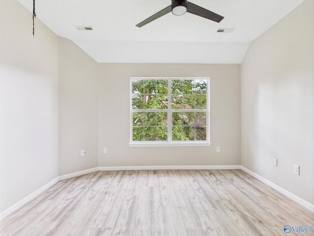 202 Declaration Cir, Madison, AL 35758 - unfurnished room with lofted ceiling, light wood-style flooring, and a ceiling fan