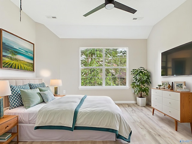 202 Declaration Cir, Madison, AL 35758 - bedroom featuring vaulted ceiling, light wood-type flooring, and a ceiling fan