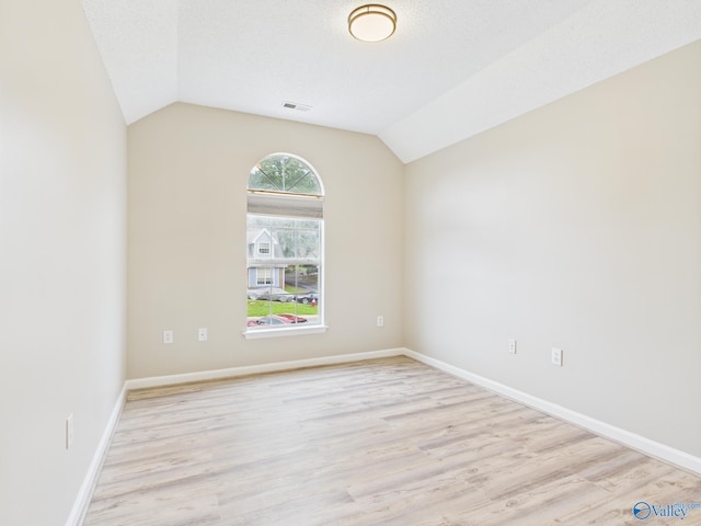 202 Declaration Cir, Madison, AL 35758 - unfurnished room with wood finished floors and lofted ceiling