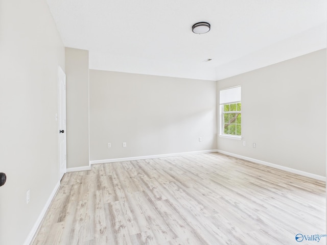 202 Declaration Cir, Madison, AL 35758 - empty room featuring light wood finished floors and baseboards
