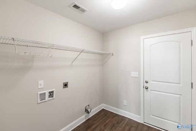 clothes washing area with hookup for an electric dryer, baseboards, visible vents, laundry area, and hookup for a washing machine