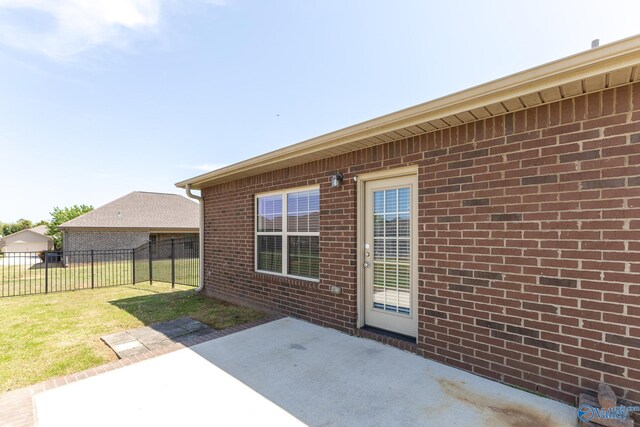 view of patio / terrace featuring fence